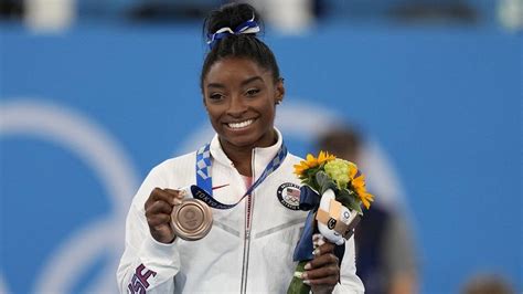 Gymnastics star Simone Biles returning to competition in August meet with Suni Lee